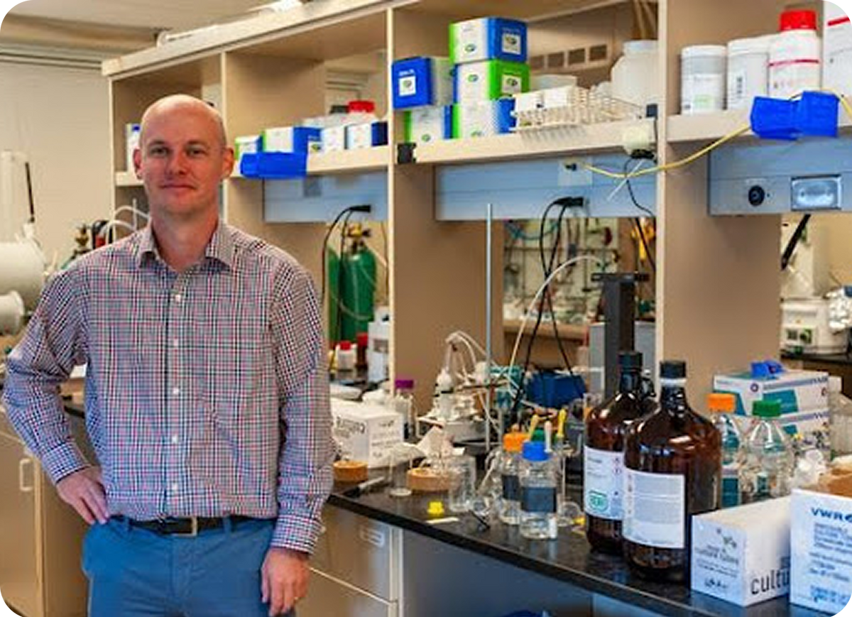 Dr. Jake standing in a laboratory